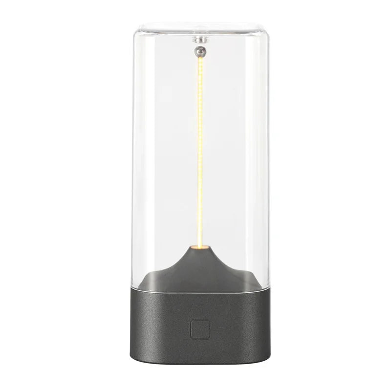 Clear glass container with a black base on a white background