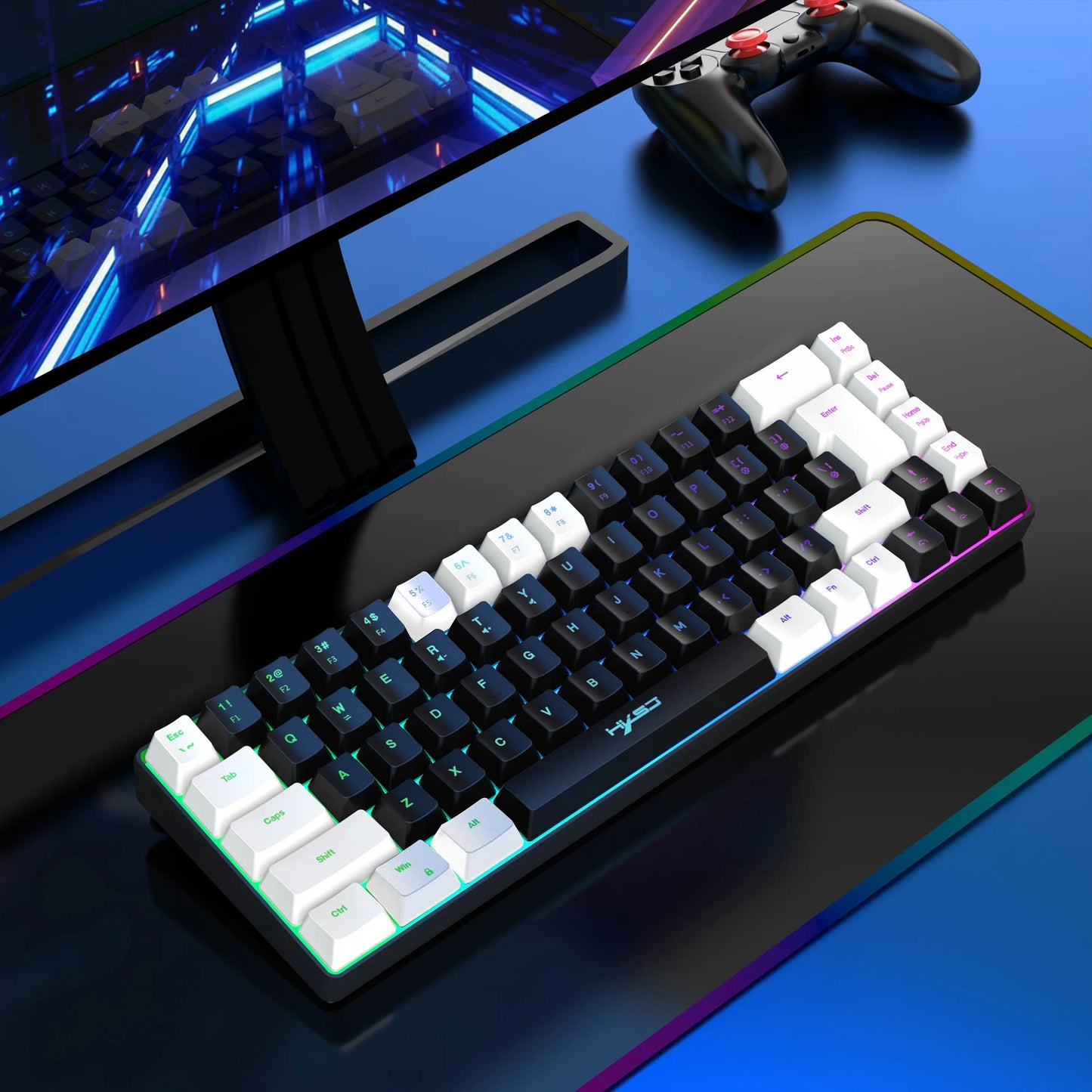 Mechanical keyboard with RGB lighting on a desk setup with a monitor and gaming controller.
