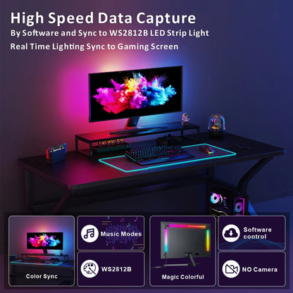 Gaming setup with LED strip light synchronization to monitor and desk.