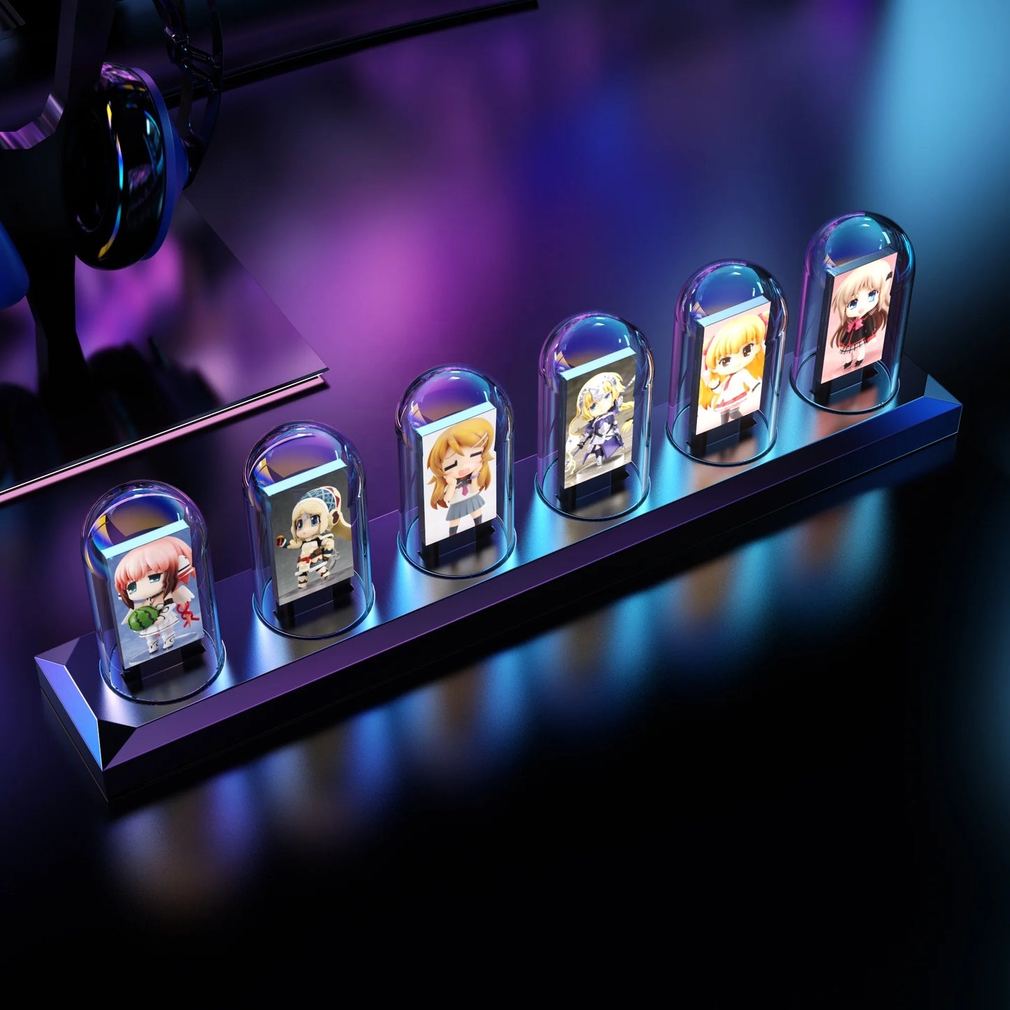 Row of small figurines in glass cases on a dark background