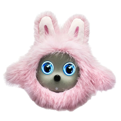 Toy with pink bunny ears and blue eyes on a white background
