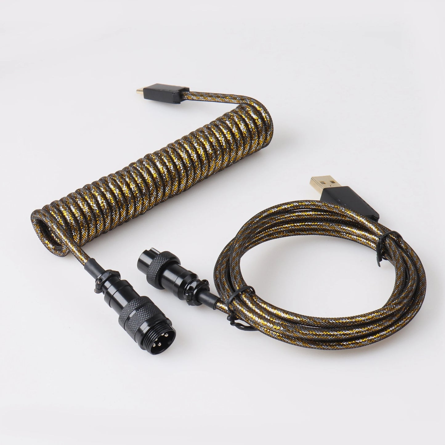 Coiled cable with connectors on a white background