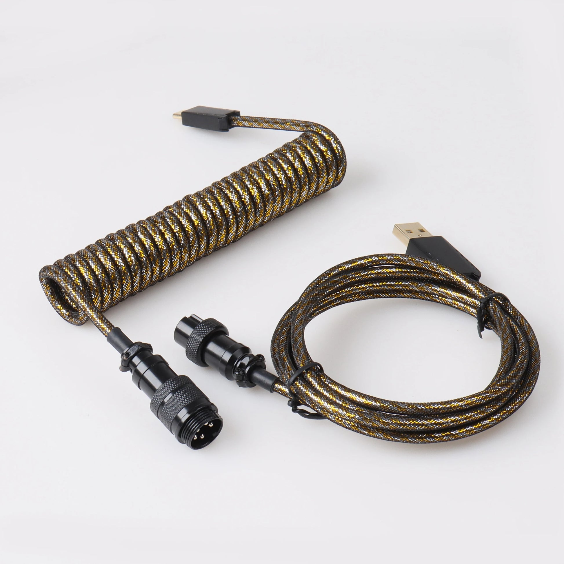 Coiled cable with connectors on a white background