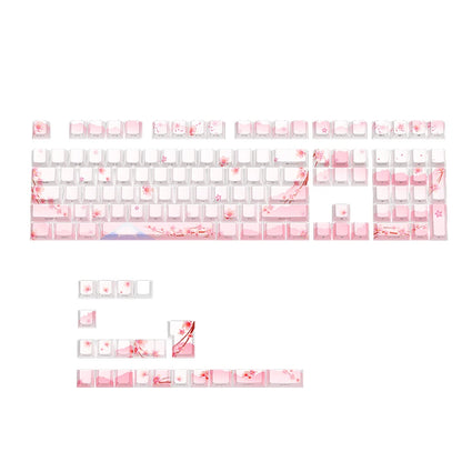 Keyboard with pink floral design on a white background