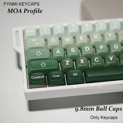 Green keycaps with 'FYNMI KEYCAPS' branding on a white background