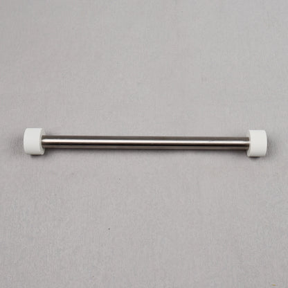 Metal rod with white ends on a gray background