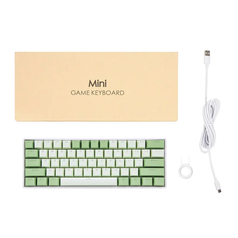 Mini game keyboard with packaging and USB cable on a white background