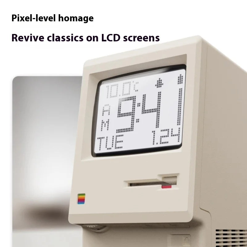 Vintage computer with LCD screen displaying time and date, featuring Apple logo.