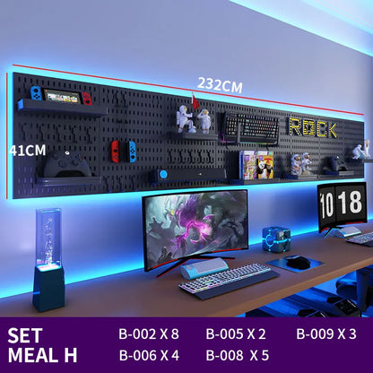 Modern gaming setup with a desk, monitor, keyboard, and various small items on a shelf.