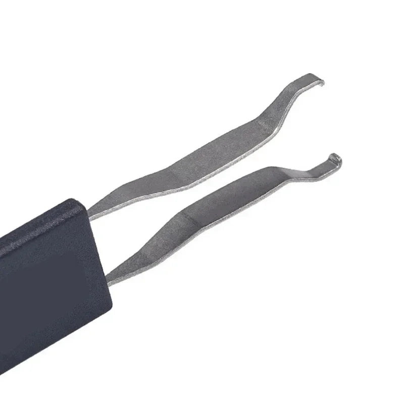 Two metal brake pads on a white background