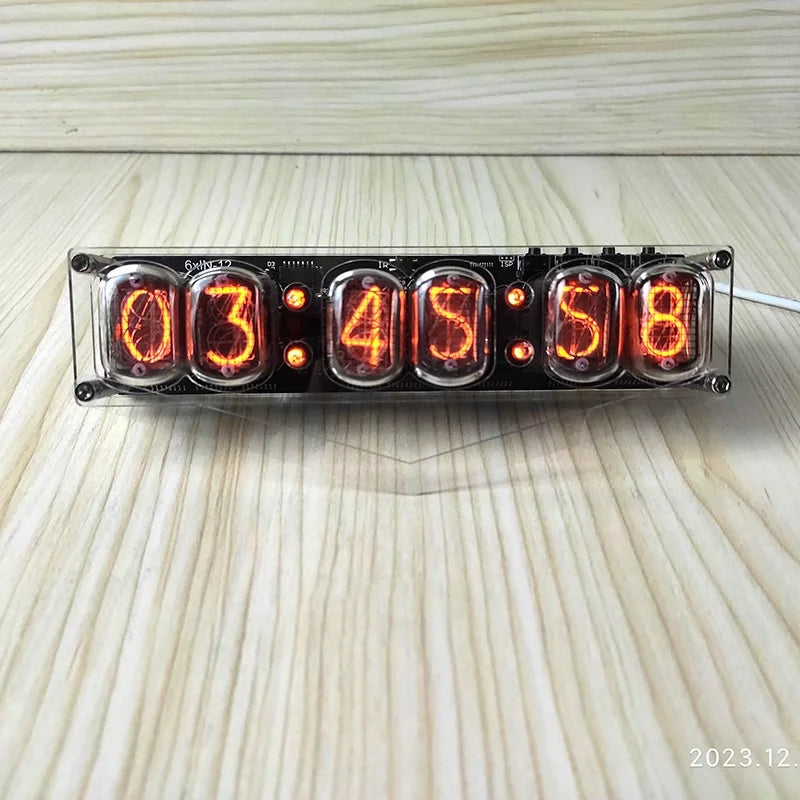 Digital clock with Nixie tube display on a wooden surface