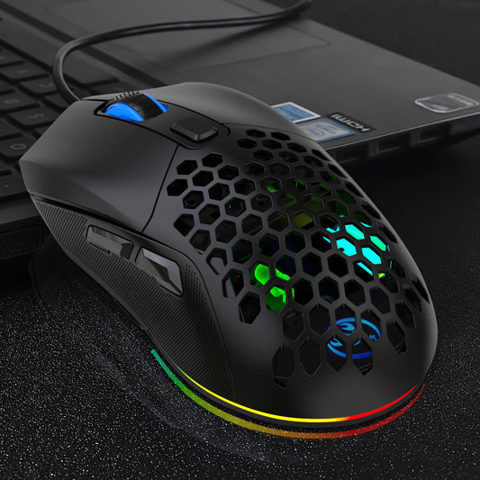 Gaming mouse with RGB lighting on a dark surface