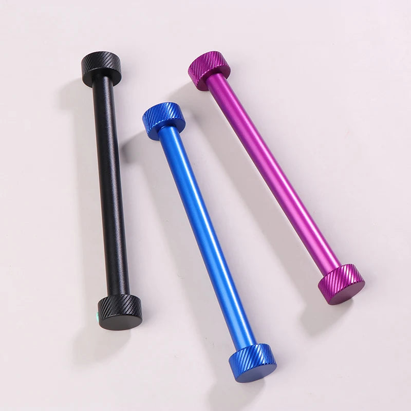 Three metal rods in black, blue, and purple on a light gray background