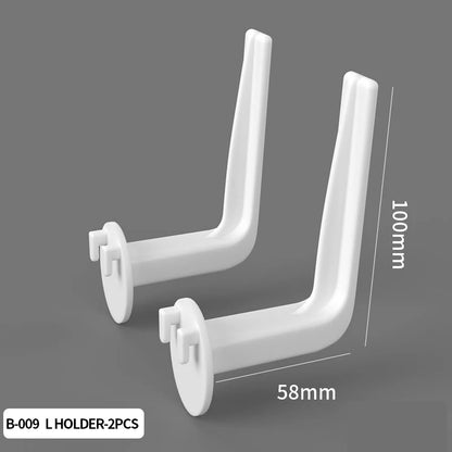 Two white L-shaped holders with dimensions on a gray background