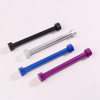Four cylindrical tools in black, silver, blue, and purple on a white background