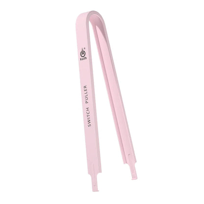 Pink switch puller with 'Kainu' branding on a white background