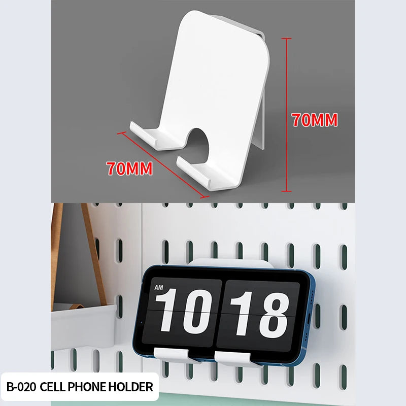 White phone holder with dimensions and a digital clock on a pegboard background