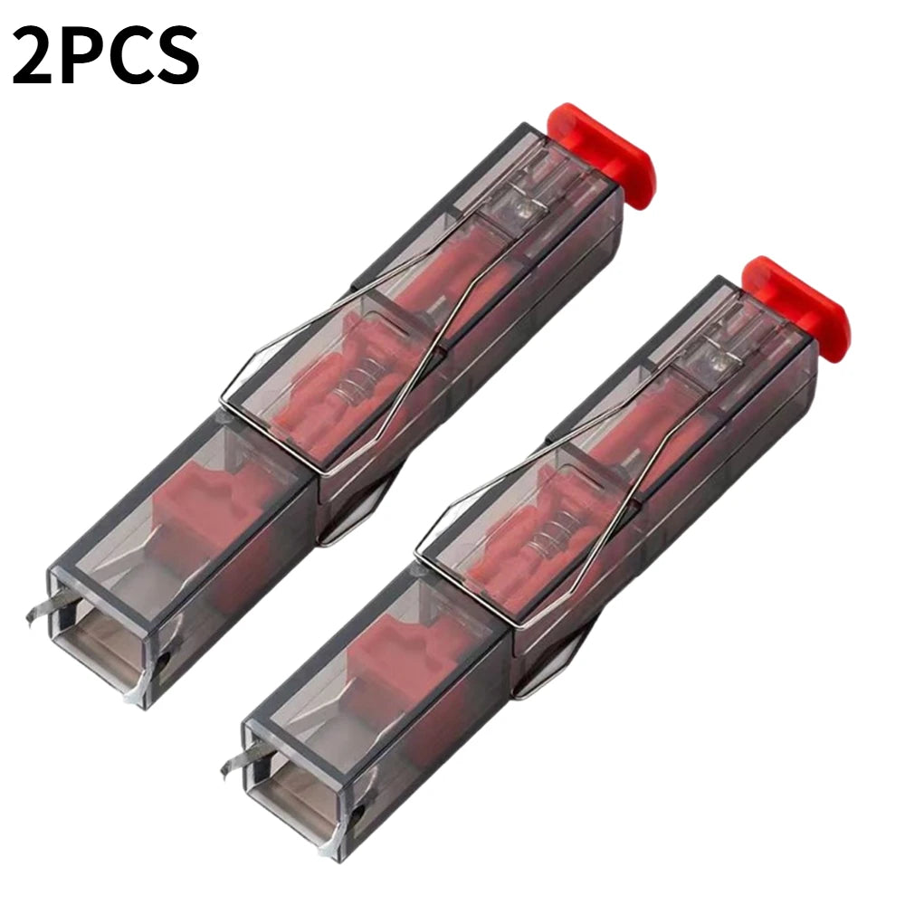 Two red and gray mechanical components in clear packaging on a white background