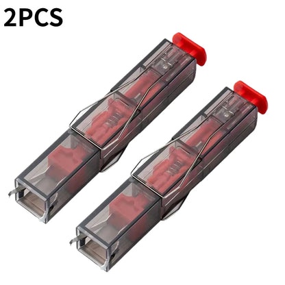 Two red and gray mechanical components in clear packaging on a white background