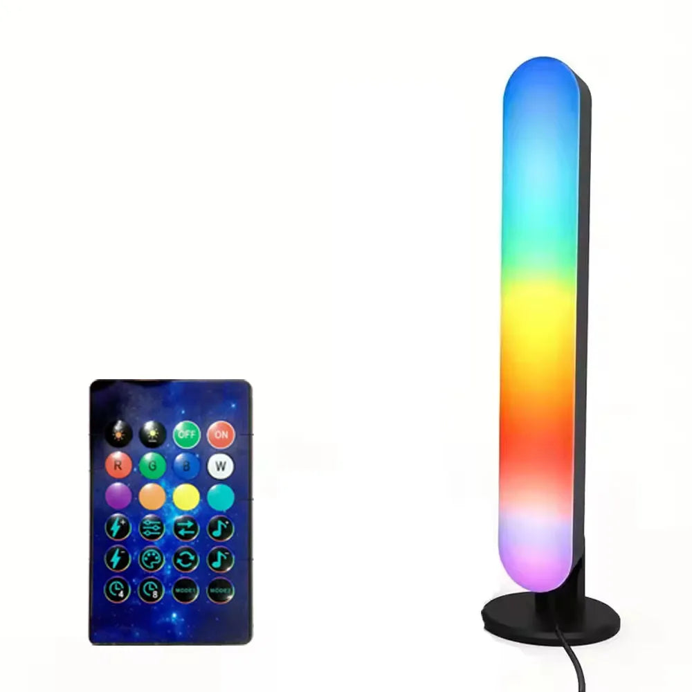 Colorful LED lamp with remote control on a white background