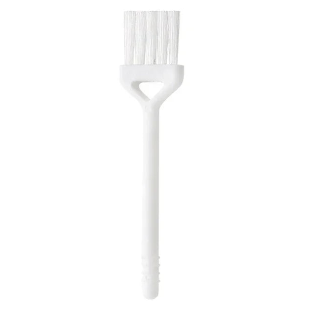 White plastic tool with a flat top and cylindrical handle on a white background