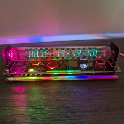 Electronic device with digital display and colorful LED lights on a dark surface.