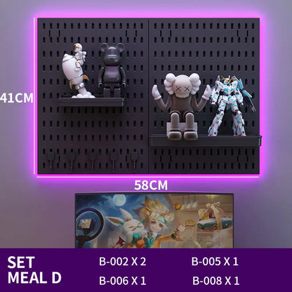 Black pegboard with toy figures and a small inset image of cartoon characters.