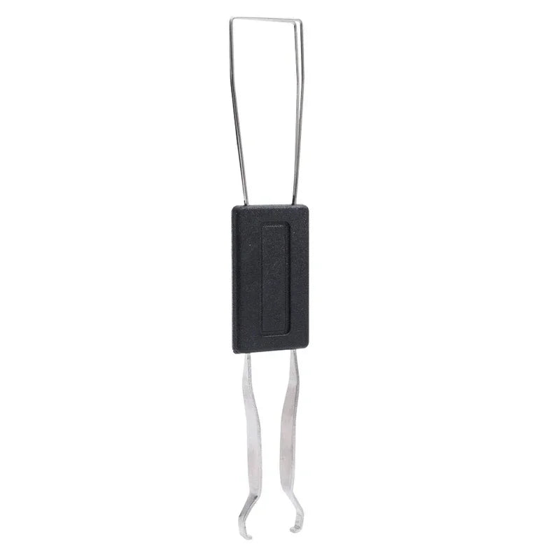 Metallic tool with a black rectangular component on a white background