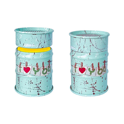 Two turquoise cylindrical containers with decorative elements on a white background