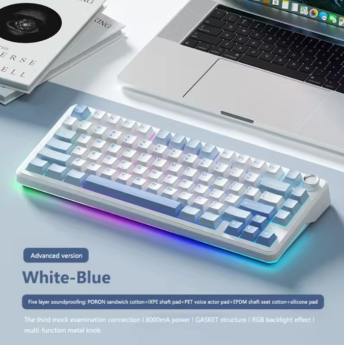 White-blue mechanical keyboard with RGB backlighting on a desk with a laptop.