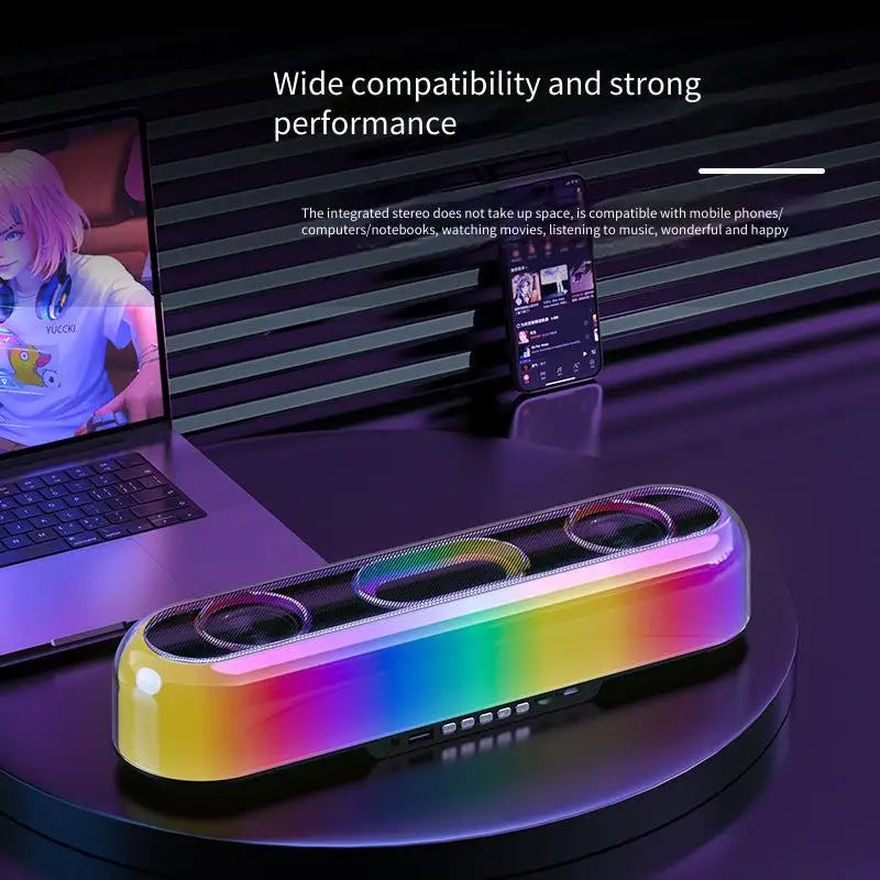 Colorful Bluetooth speaker on a dark surface with text about compatibility and performance.