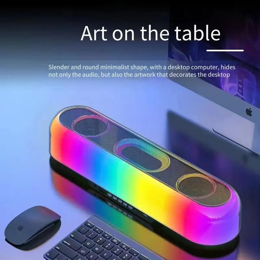 Colorful speaker on a desk with text about its design and functionality