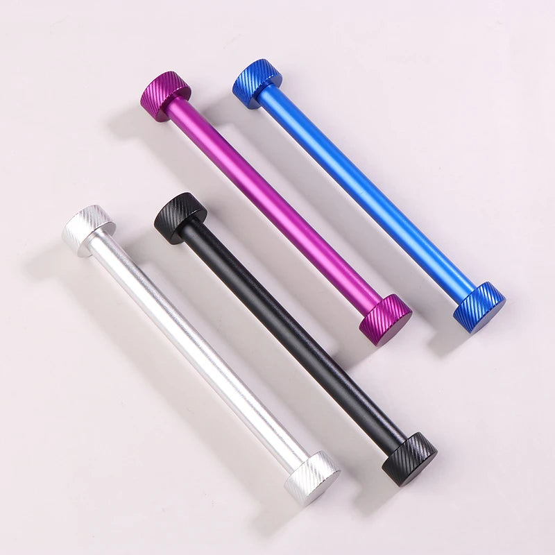 Four metallic bars in black, silver, pink, and blue on a light gray background